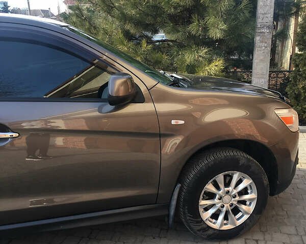 Коричневый Мицубиси АСХ, объемом двигателя 1.8 л и пробегом 112 тыс. км за 9200 $, фото 7 на Automoto.ua