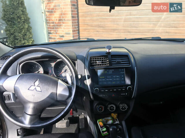 Коричневый Мицубиси АСХ, объемом двигателя 1.8 л и пробегом 112 тыс. км за 9200 $, фото 12 на Automoto.ua