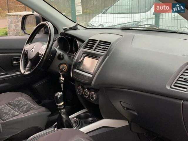 Коричневый Мицубиси АСХ, объемом двигателя 1.8 л и пробегом 202 тыс. км за 11755 $, фото 33 на Automoto.ua