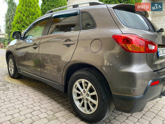 Коричневый Мицубиси АСХ, объемом двигателя 1.8 л и пробегом 327 тыс. км за 8900 $, фото 2 на Automoto.ua