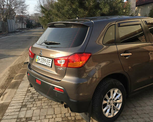 Коричневый Мицубиси АСХ, объемом двигателя 1.8 л и пробегом 112 тыс. км за 9200 $, фото 5 на Automoto.ua