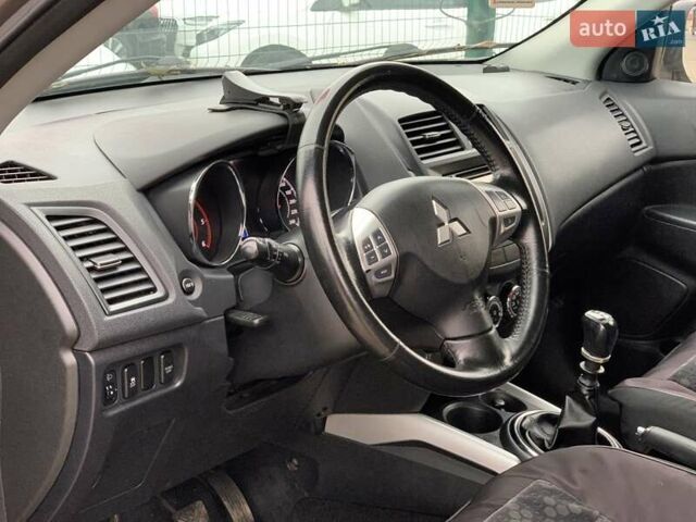 Коричневый Мицубиси АСХ, объемом двигателя 1.8 л и пробегом 202 тыс. км за 11755 $, фото 23 на Automoto.ua