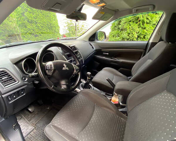 Коричневый Мицубиси АСХ, объемом двигателя 1.8 л и пробегом 327 тыс. км за 8900 $, фото 7 на Automoto.ua