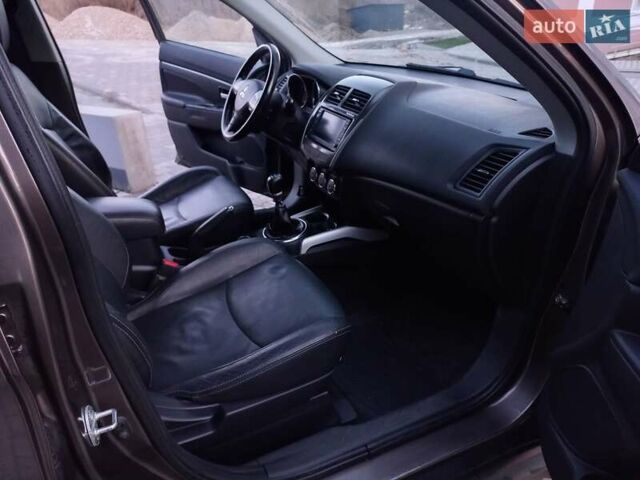 Коричневий Міцубісі АСХ, об'ємом двигуна 1.8 л та пробігом 238 тис. км за 8999 $, фото 25 на Automoto.ua