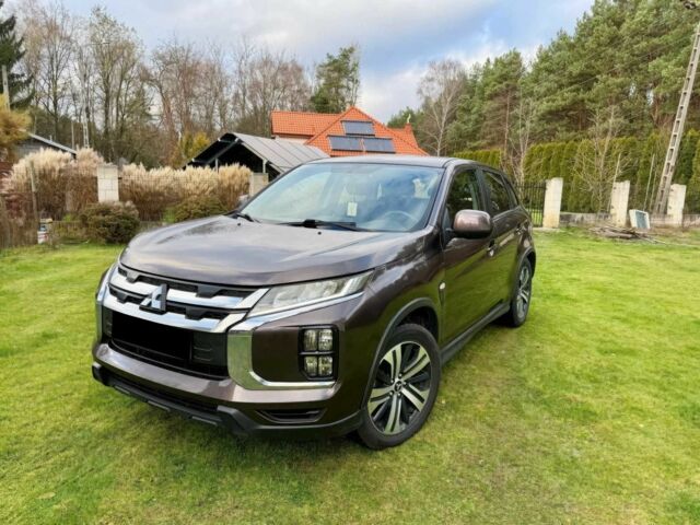 Коричневый Мицубиси АСХ, объемом двигателя 2 л и пробегом 55 тыс. км за 14800 $, фото 1 на Automoto.ua