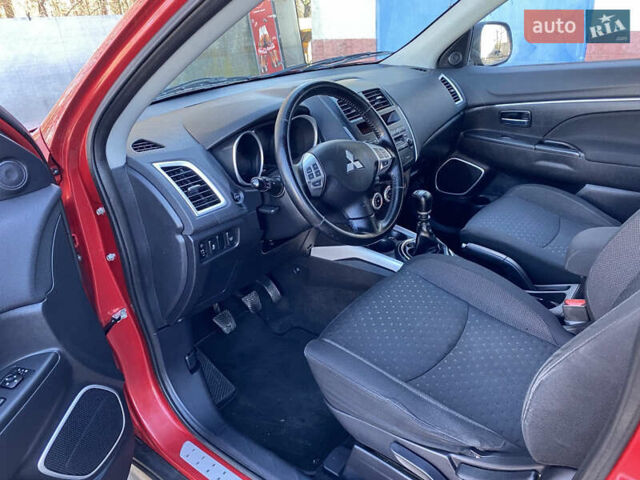 Красный Мицубиси АСХ, объемом двигателя 1.8 л и пробегом 234 тыс. км за 8900 $, фото 17 на Automoto.ua