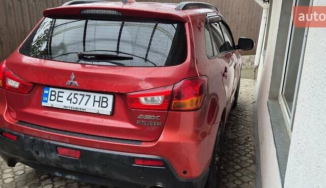 Червоний Міцубісі АСХ, об'ємом двигуна 1.8 л та пробігом 199 тис. км за 10500 $, фото 1 на Automoto.ua