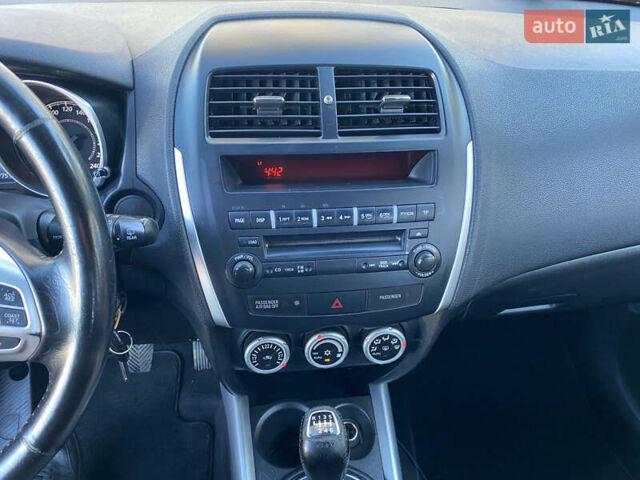 Красный Мицубиси АСХ, объемом двигателя 1.8 л и пробегом 234 тыс. км за 8900 $, фото 21 на Automoto.ua