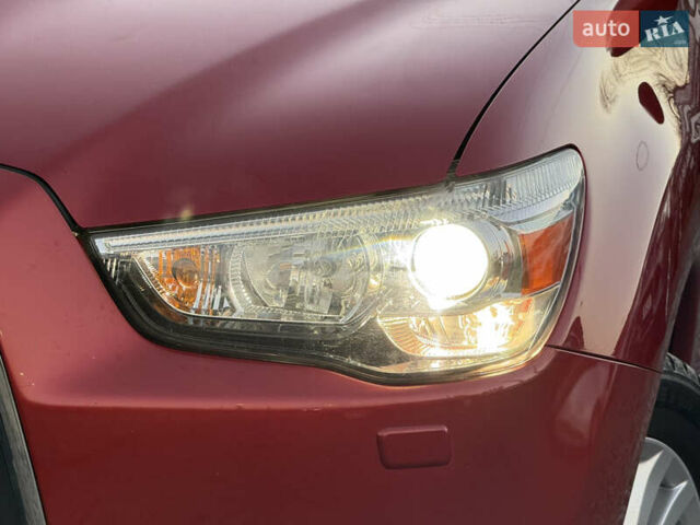 Червоний Міцубісі АСХ, об'ємом двигуна 1.8 л та пробігом 182 тис. км за 10999 $, фото 15 на Automoto.ua
