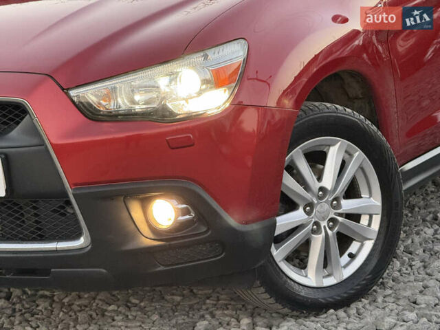 Червоний Міцубісі АСХ, об'ємом двигуна 1.8 л та пробігом 182 тис. км за 10999 $, фото 14 на Automoto.ua