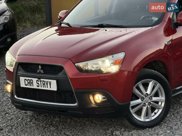 Червоний Міцубісі АСХ, об'ємом двигуна 1.8 л та пробігом 182 тис. км за 10999 $, фото 13 на Automoto.ua