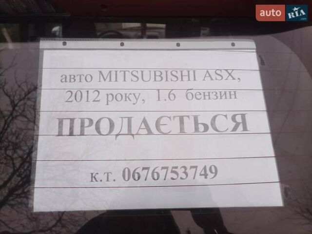 Красный Мицубиси АСХ, объемом двигателя 1.59 л и пробегом 171 тыс. км за 8850 $, фото 1 на Automoto.ua