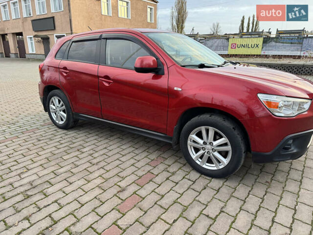 Красный Мицубиси АСХ, объемом двигателя 1.59 л и пробегом 150 тыс. км за 9000 $, фото 3 на Automoto.ua