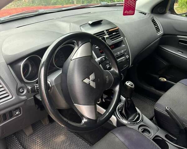 Красный Мицубиси АСХ, объемом двигателя 1.59 л и пробегом 150 тыс. км за 9000 $, фото 15 на Automoto.ua