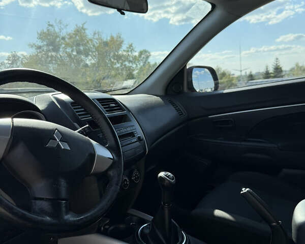 Червоний Міцубісі АСХ, об'ємом двигуна 1.59 л та пробігом 203 тис. км за 8600 $, фото 19 на Automoto.ua
