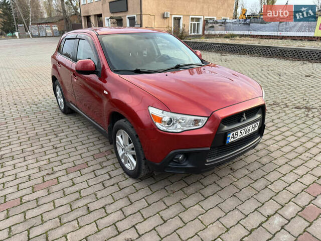 Красный Мицубиси АСХ, объемом двигателя 1.59 л и пробегом 150 тыс. км за 9000 $, фото 1 на Automoto.ua