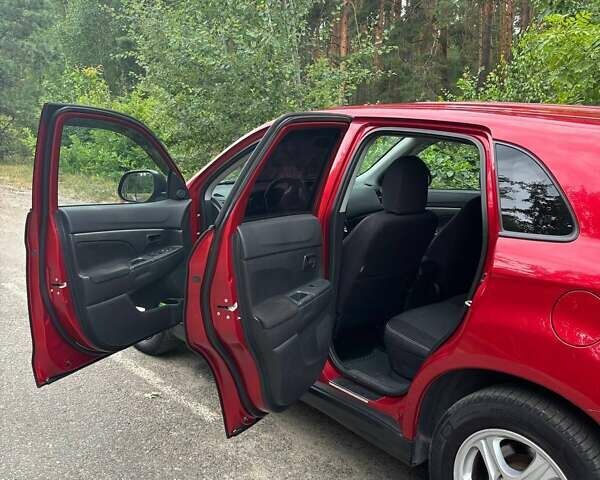 Красный Мицубиси АСХ, объемом двигателя 1.59 л и пробегом 150 тыс. км за 9000 $, фото 8 на Automoto.ua