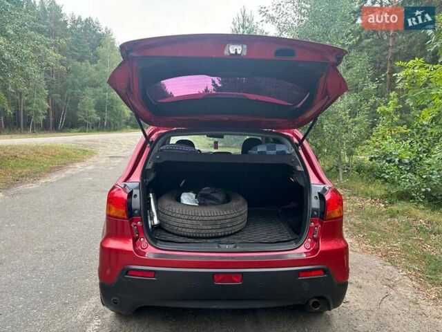 Красный Мицубиси АСХ, объемом двигателя 1.59 л и пробегом 150 тыс. км за 9000 $, фото 6 на Automoto.ua