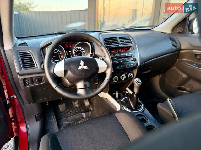 Красный Мицубиси АСХ, объемом двигателя 1.59 л и пробегом 246 тыс. км за 9350 $, фото 26 на Automoto.ua