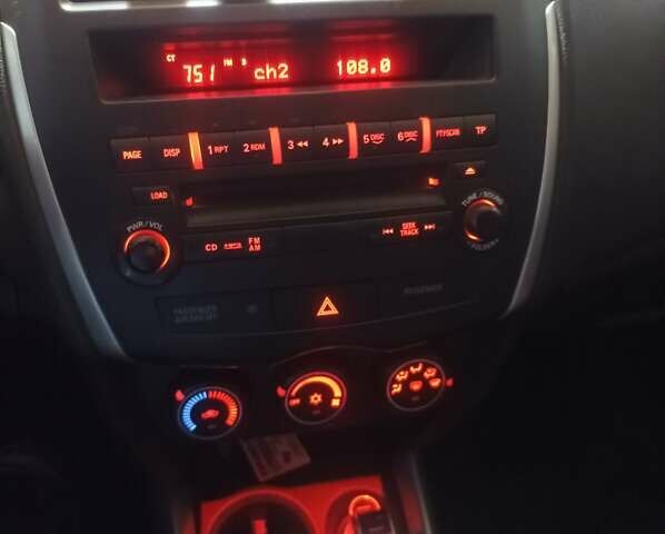 Красный Мицубиси АСХ, объемом двигателя 1.59 л и пробегом 171 тыс. км за 8850 $, фото 5 на Automoto.ua