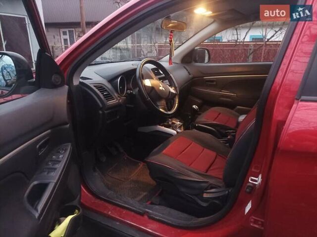 Красный Мицубиси АСХ, объемом двигателя 1.59 л и пробегом 171 тыс. км за 8850 $, фото 3 на Automoto.ua