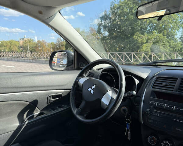 Червоний Міцубісі АСХ, об'ємом двигуна 1.59 л та пробігом 203 тис. км за 8600 $, фото 5 на Automoto.ua