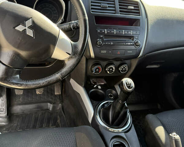 Червоний Міцубісі АСХ, об'ємом двигуна 1.59 л та пробігом 203 тис. км за 8600 $, фото 15 на Automoto.ua
