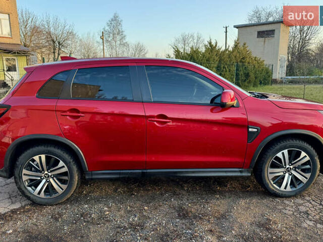 Красный Мицубиси АСХ, объемом двигателя 2 л и пробегом 57 тыс. км за 16500 $, фото 6 на Automoto.ua