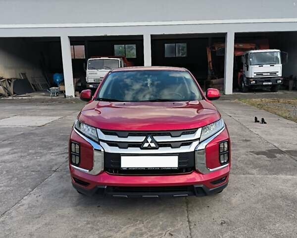 Красный Мицубиси АСХ, объемом двигателя 1.59 л и пробегом 50 тыс. км за 17200 $, фото 1 на Automoto.ua