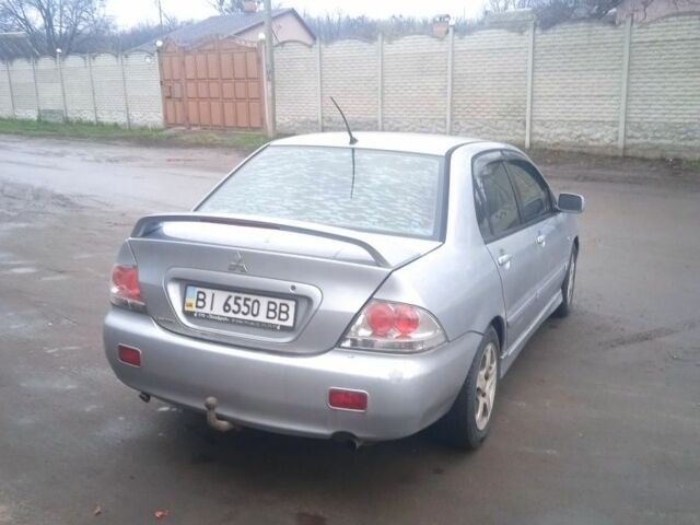 Серый Мицубиси АСХ, объемом двигателя 2 л и пробегом 222 тыс. км за 2850 $, фото 3 на Automoto.ua