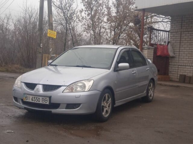 Серый Мицубиси АСХ, объемом двигателя 2 л и пробегом 222 тыс. км за 2850 $, фото 1 на Automoto.ua