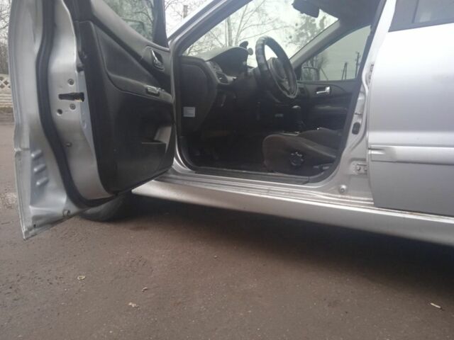 Серый Мицубиси АСХ, объемом двигателя 2 л и пробегом 222 тыс. км за 2850 $, фото 4 на Automoto.ua