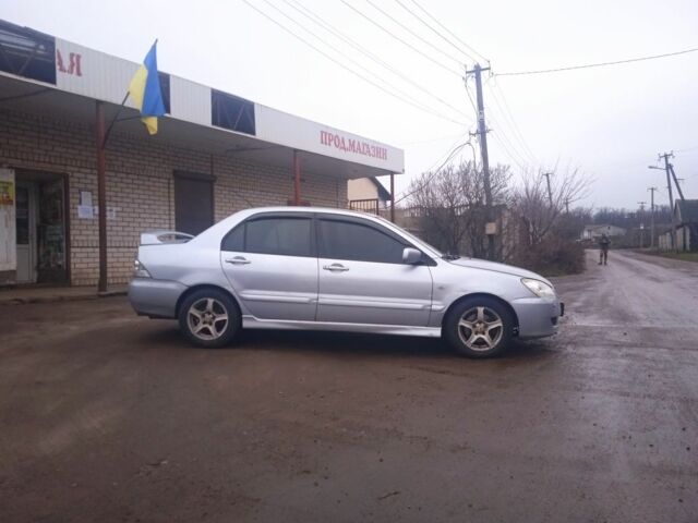 Серый Мицубиси АСХ, объемом двигателя 2 л и пробегом 222 тыс. км за 2850 $, фото 2 на Automoto.ua