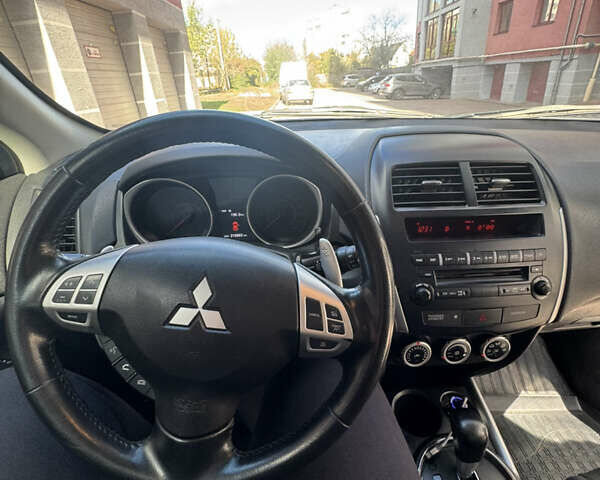 Серый Мицубиси АСХ, объемом двигателя 1.8 л и пробегом 218 тыс. км за 9399 $, фото 10 на Automoto.ua