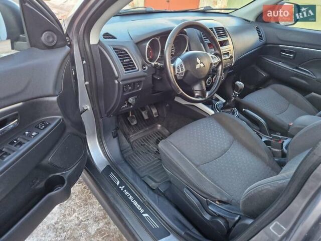 Серый Мицубиси АСХ, объемом двигателя 1.8 л и пробегом 236 тыс. км за 9300 $, фото 16 на Automoto.ua