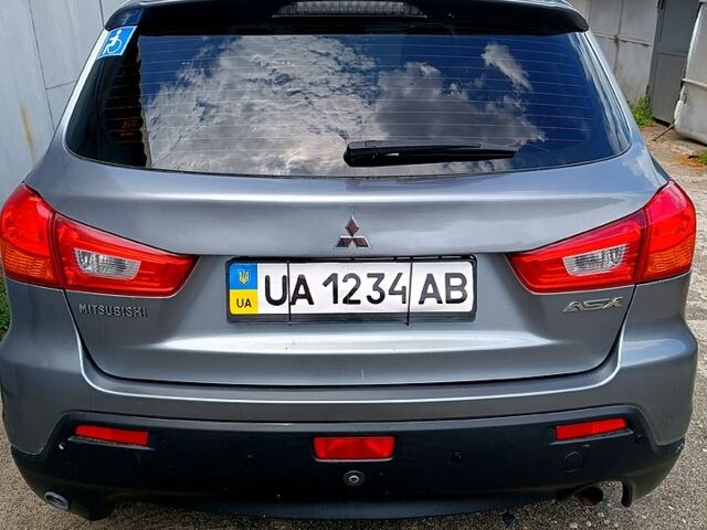 Серый Мицубиси АСХ, объемом двигателя 1.8 л и пробегом 146 тыс. км за 9900 $, фото 1 на Automoto.ua