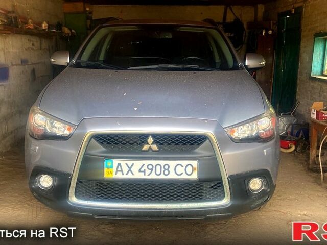 Серый Мицубиси АСХ, объемом двигателя 2 л и пробегом 155 тыс. км за 12000 $, фото 1 на Automoto.ua
