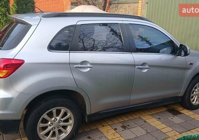 Серый Мицубиси АСХ, объемом двигателя 2 л и пробегом 142 тыс. км за 11000 $, фото 1 на Automoto.ua