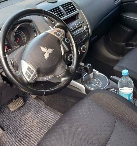 Серый Мицубиси АСХ, объемом двигателя 2 л и пробегом 142 тыс. км за 11000 $, фото 6 на Automoto.ua