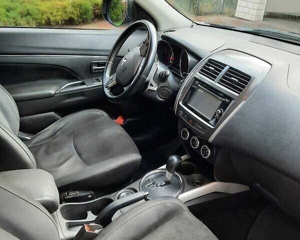 Серый Мицубиси АСХ, объемом двигателя 2 л и пробегом 212 тыс. км за 11300 $, фото 5 на Automoto.ua