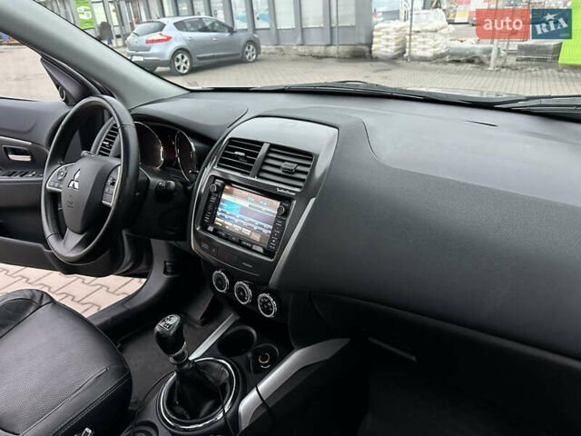 Серый Мицубиси АСХ, объемом двигателя 1.8 л и пробегом 215 тыс. км за 13800 $, фото 46 на Automoto.ua