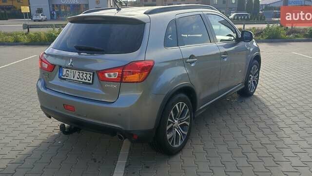 Серый Мицубиси АСХ, объемом двигателя 1.6 л и пробегом 208 тыс. км за 12950 $, фото 3 на Automoto.ua