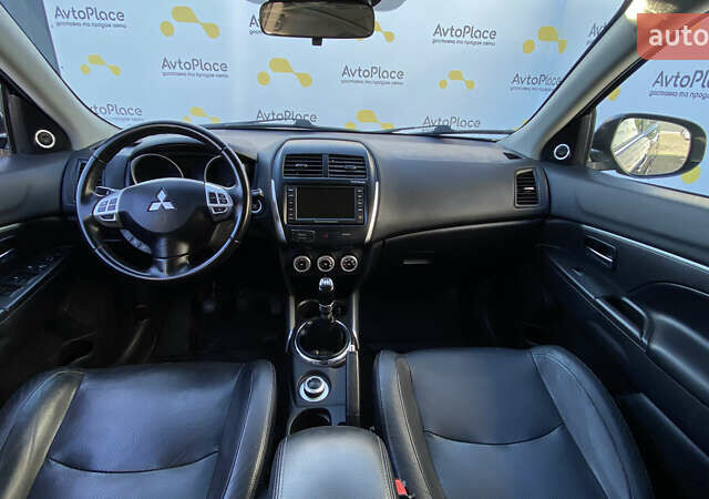 Синий Мицубиси АСХ, объемом двигателя 1.8 л и пробегом 232 тыс. км за 8100 $, фото 24 на Automoto.ua