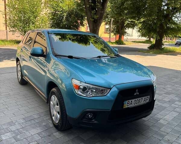 Синий Мицубиси АСХ, объемом двигателя 1.59 л и пробегом 122 тыс. км за 9500 $, фото 6 на Automoto.ua