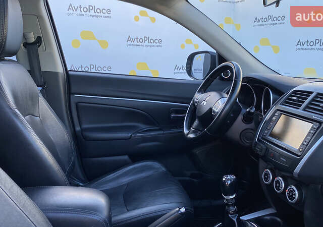 Синий Мицубиси АСХ, объемом двигателя 1.8 л и пробегом 232 тыс. км за 8100 $, фото 59 на Automoto.ua