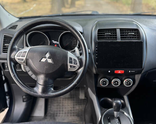 Синій Міцубісі АСХ, об'ємом двигуна 1.8 л та пробігом 156 тис. км за 10300 $, фото 10 на Automoto.ua