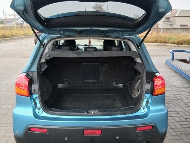 Синий Мицубиси АСХ, объемом двигателя 1.8 л и пробегом 232 тыс. км за 8500 $, фото 6 на Automoto.ua