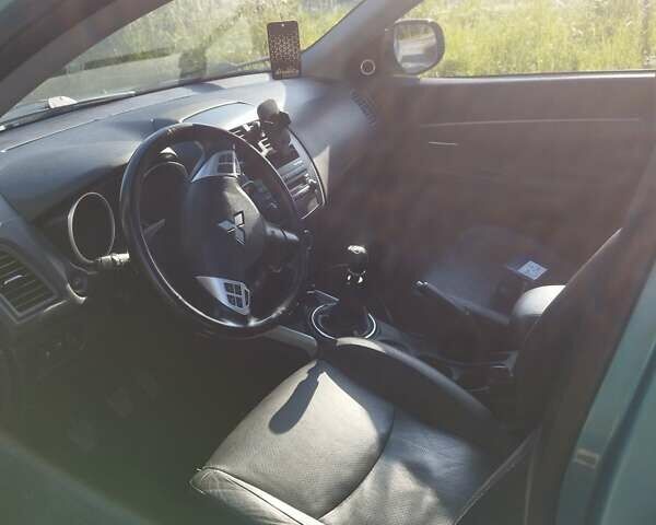 Синий Мицубиси АСХ, объемом двигателя 1.8 л и пробегом 268 тыс. км за 10500 $, фото 17 на Automoto.ua