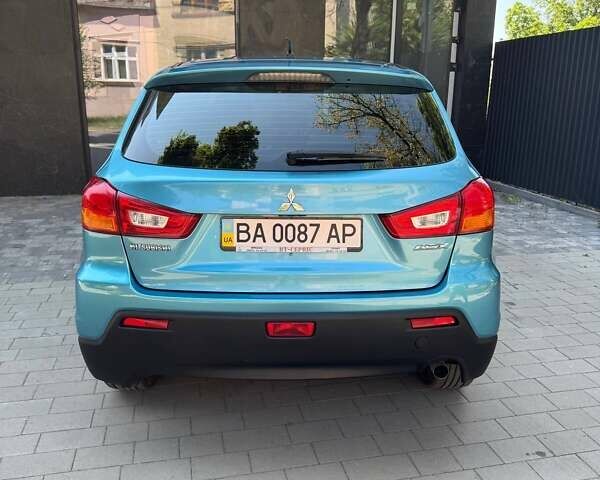 Синий Мицубиси АСХ, объемом двигателя 1.59 л и пробегом 122 тыс. км за 9500 $, фото 4 на Automoto.ua