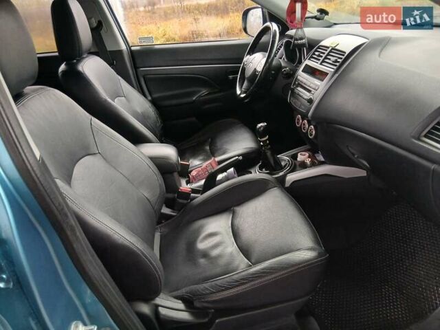 Синий Мицубиси АСХ, объемом двигателя 1.8 л и пробегом 232 тыс. км за 8500 $, фото 8 на Automoto.ua